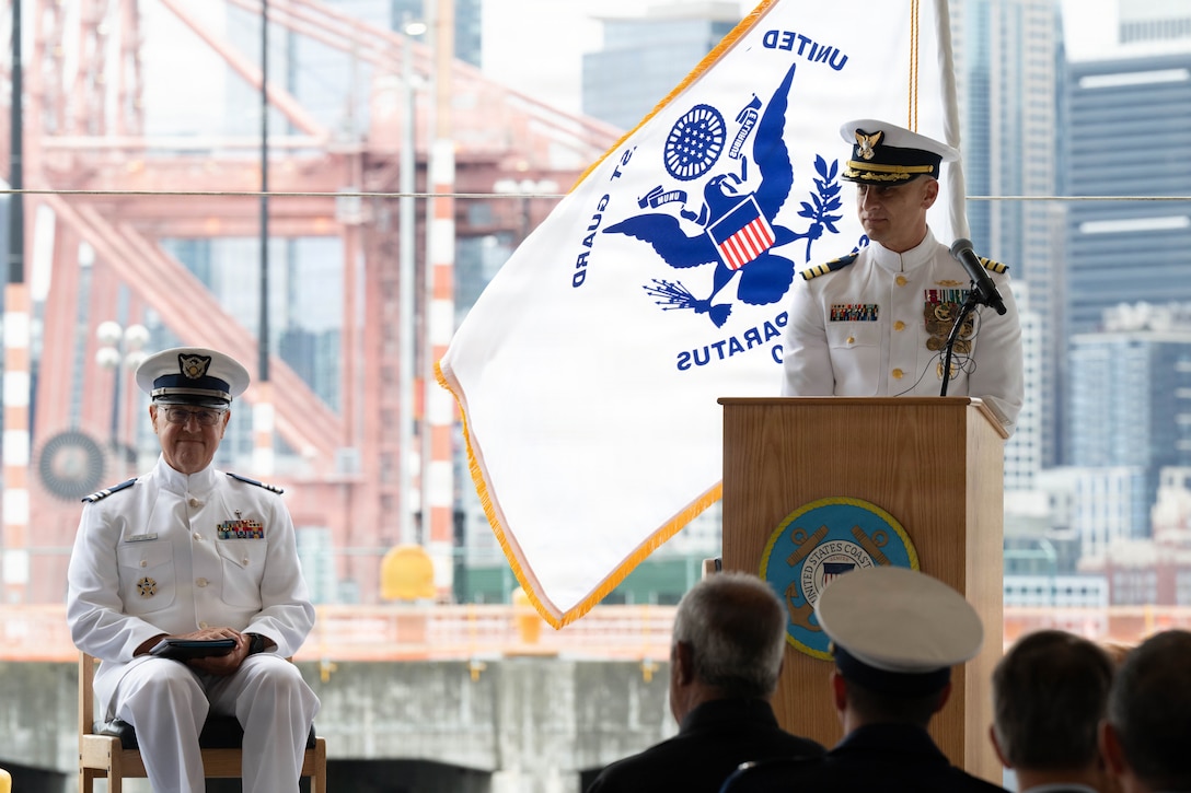 Coast Guard Cmdr. Samuel Blase provides remarks as emcee during USCGC Polar Star's (WAGB 10) change-of-command ceremony at U.S. Coast Guard Base Seattle, June 29, 2026. Capt. Justin O. Vanden Heuvel assumed command of the Polar Star from Capt. Jeffrey J. Rasnake during the cutter's change of command ceremony (U.S. Coast Guard photo by Petty Officer 3rd Class Adrian Sanchez Villa)