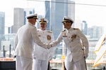 Coast Guard Capt. Justin O. Vanden Heuvel assumes command of the USCGC Polar Star (WAGB 10) during the cutter's change-of-command ceremony at Coast Guard Base Seattle, June 29, 2026. Vanden Heuvel previously served as the Leadership Development Center's school chief of command and operations. (US. Coast Guard photo by Petty Officer 3rd Class Adrian Sanchez Villa)