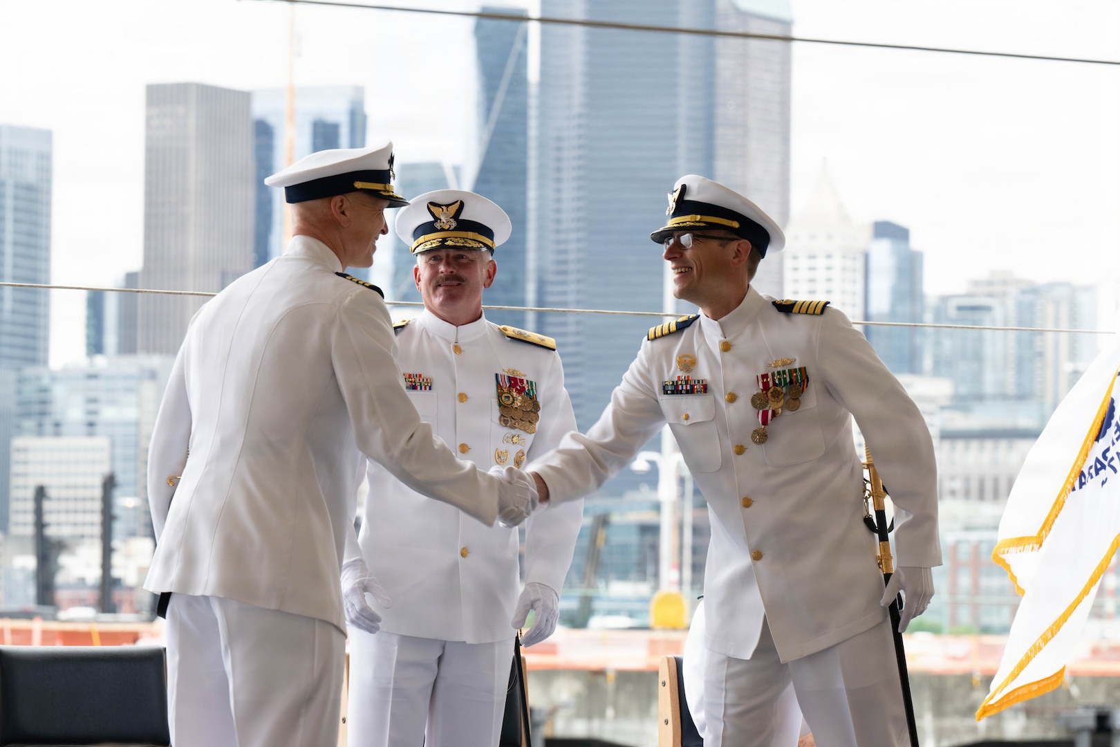 Coast Guard Capt. Justin O. Vanden Heuvel assumes command of the USCGC Polar Star (WAGB 10) during the cutter's change-of-command ceremony at Coast Guard Base Seattle, June 29, 2026. Vanden Heuvel previously served as the Leadership Development Center's school chief of command and operations. (US. Coast Guard photo by Petty Officer 3rd Class Adrian Sanchez Villa)