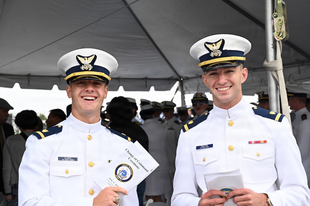 Crew members, assigned to the U.S. Coast Guard Cutter Waesche (WMSL 751), hand out programs to attendees for Waeche’s change of command ceremony on Coast Guard Island in Alameda, California, July 9, 2026. The change-of-command ceremony is a time honored tradition that formally transfers authority, responsibility, and accountability from one commanding officer to another. (U.S. Coast Guard photo by Petty Officer 3rd Class Danish Khan.)