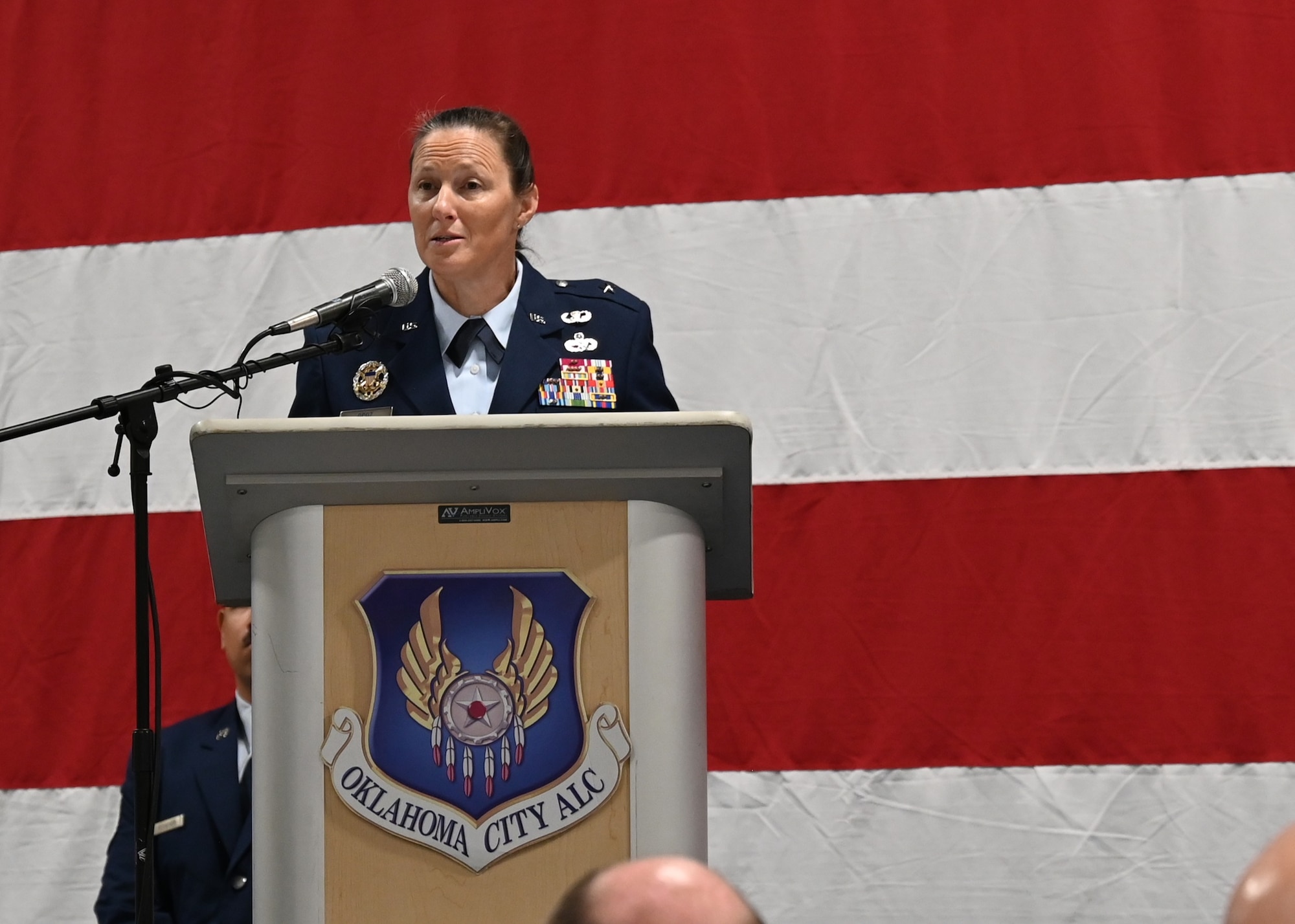 Woman on stage giving a speech