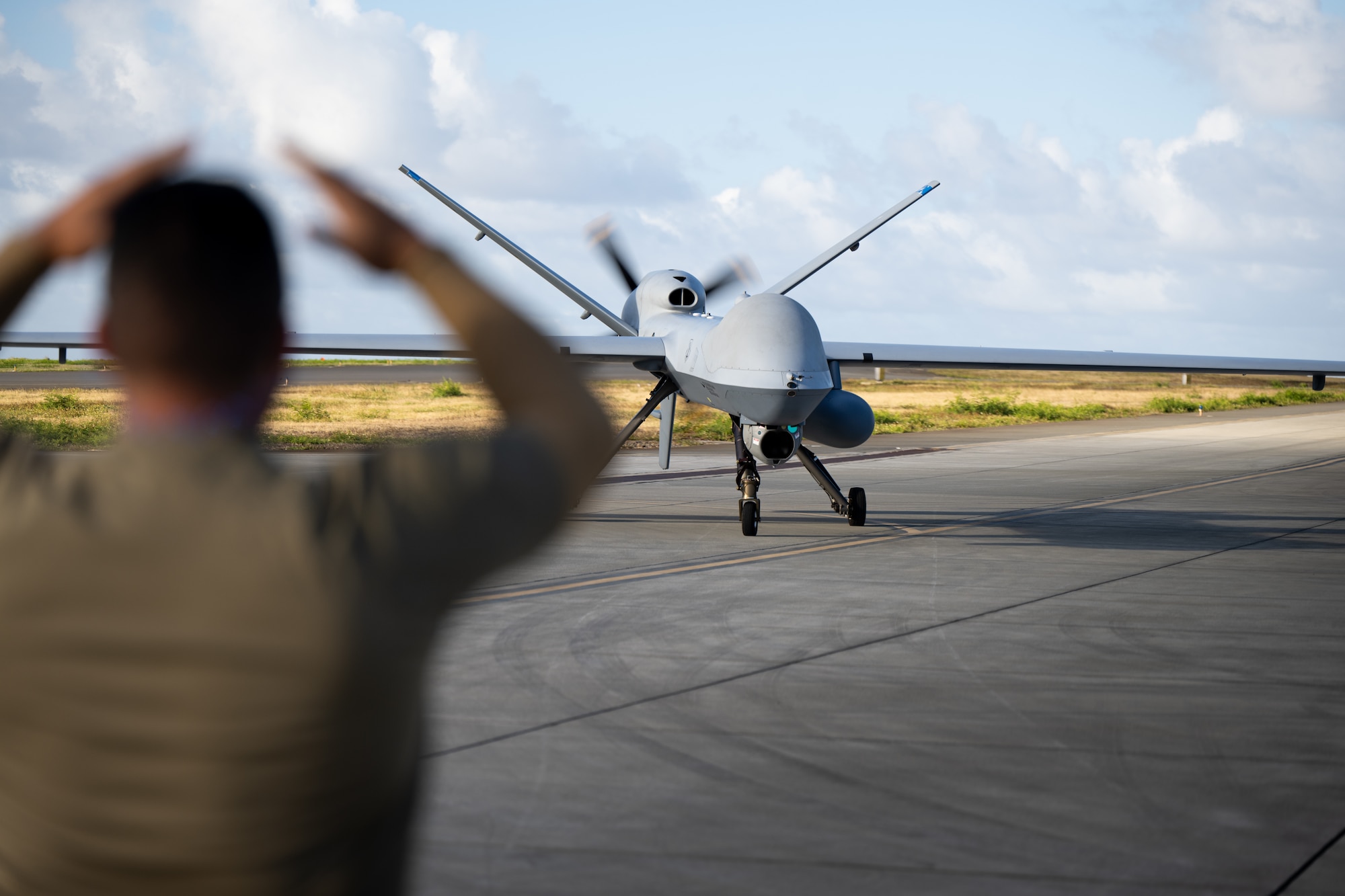 MQ-9 Reaper aircraft and assigned personnel in Hawaii, Aug. 7, 2024. The MQ-9 Reaper is a remotely piloted aircraft designed to provide persistent intelligence, surveillance, and reconnaissance, as well as precision strike capabilities. (U.S. Air National Guard photo by Tech. Sgt. Joseph Pagan)