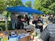 Naval District Washington teammates gather at Willard Park on the Washington Navy Yard for the command picnic.