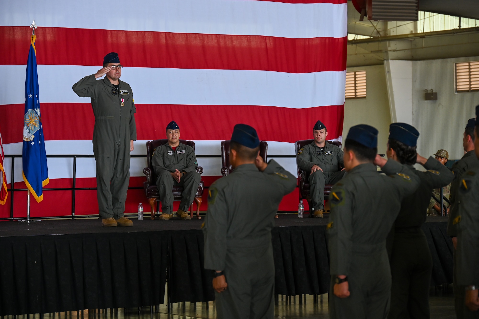 U.S. Air Force Lt. Col. Aaron Borszich, 47th Student Squadron (STUS) outgoing commander, renders a final salute to his squadron during the 47th STUS change of command ceremony at Laughlin Air Force Base, Texas, July 10, 2026. Change of command ceremonies represent a formal transfer of authority and responsibility of a unit from one commanding officer to another. (U.S. Air Force photo by Airman 1st Class Kylie Rabb)