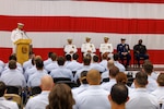 Coast Guard Cmdr. Wesley Jones, executive officer of Coast Guard Air Station Sitka, speaks at the change-of-command ceremony of the air station in Sitka, Alaska, July 10, 2026. A change-of-command ceremony is a time-honored tradition that represents the passing of authority from one commanding officer to the next. 

(Courtesy photo by Auxiliarist Don Kluting)
