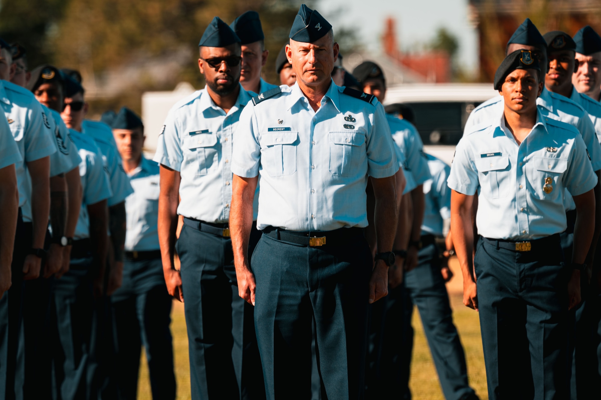 Airmen from across 20th Air Force stand in formation during the 20th AF change of command at F.E. Warren Air Force Base, Cheyenne, Wyoming, July 10, 2026. The change of command ceremony formally transferred leadership and responsibility of the Numbered Air Force from the outgoing commander to the incoming commander while honoring the unit's continued commitment to mission success.(U.S. Air Force photo by Senior Airman Mattison Cole)