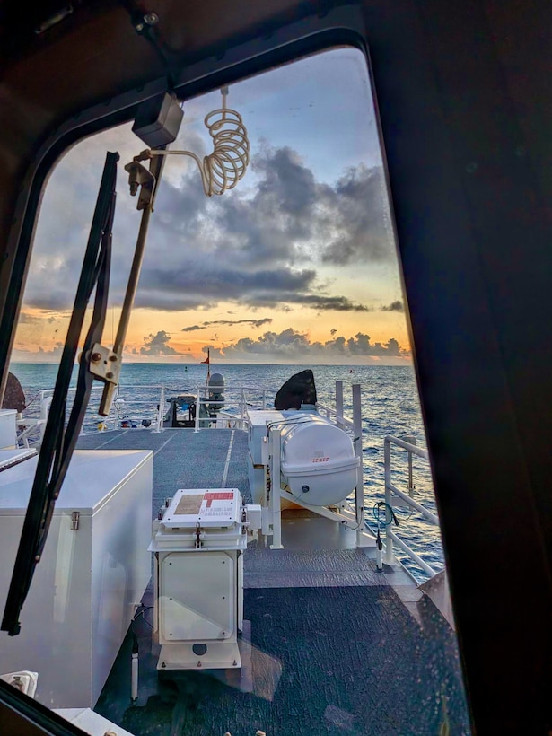 USCGC Myrtle Hazard (WPC 1139) and Navy Explosive Ordnance Disposal Mobile Unit Five transit off the Northern Marianas on July 11, 2026, allowing the Captain of the Port to lift restrictions, restoring maritime commerce flow. The U.S. Coast Guard is coordinating with port partners to address already identified hazards and new issues following Super Typhoon Bavi. Multiple navigational aids are reportedly discrepant, off station, or simply missing. (U.S. Coast Guard photo by Lt. Drew Lovullo)