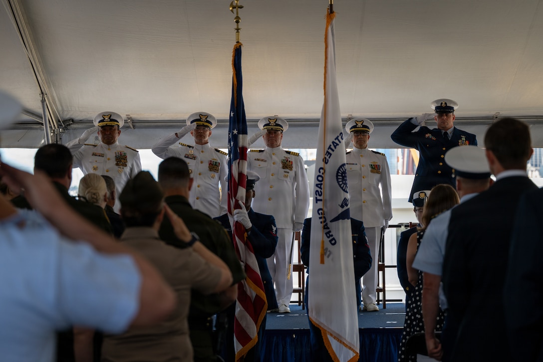 U.S. Coast Guard senior leaders render honors during the Coast Guard Sector Puget Sound change-of-command ceremony in Seattle, Washington, July 10, 2026