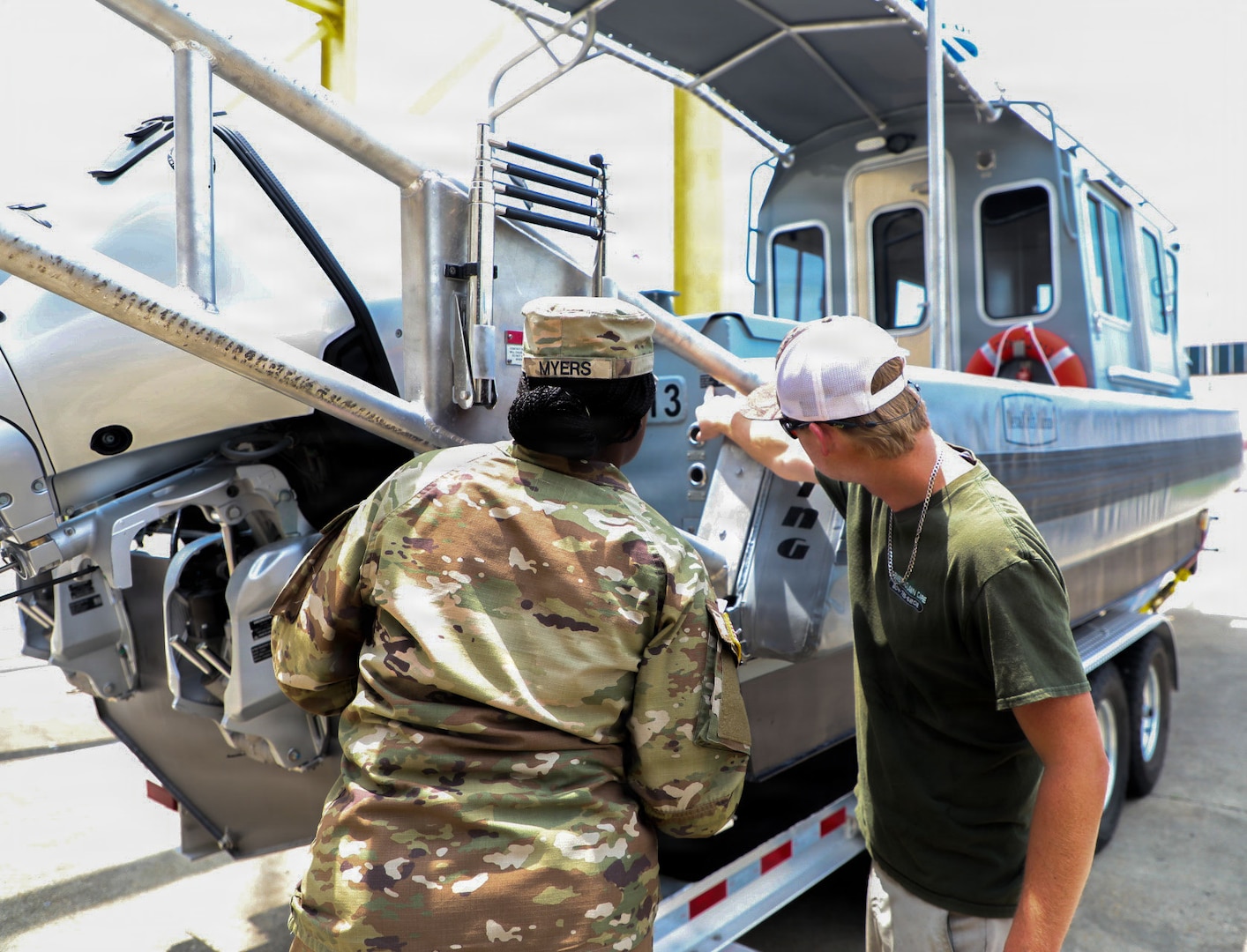 U.S. Army Sgt. Nigeria Myers with the District of Columbia National Guard, assigned to Joint Task Force District of Columbia, in support of the DC Safe and Beautiful mission, assesses the newly transferred 260th Special Purpose Brigade boat in Williamsburg, Va., June 26, 2026. About 4,500 National Guard members are supporting the mission, providing critical assistance to the Metropolitan Police Department to help ensure the safety of residents, commuters, and visitors throughout the District.