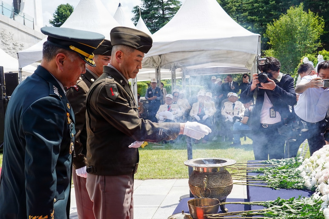 U.S. Army Brig. Gen. Jin Pak offers incense at a memorial altar during the sixth-anniversary commemoration ceremony for ROK Army Gen. Paik Sun Yup at the Dabu-dong War Memorial Museum in South Korea.