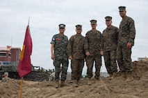 Senior leaders with 3rd Marine Logistics Group and Republic of Korea Marine Corps Col. SaeYoung Oh, commanding officer of the Republic of Korea Marine Corps Marine Logistics Group, pose for a photo at Dogu Beach, Pohang, South Korea, July 7, 2026. CJLOTS 26 is a combined exercise designed to integrate U.S. and Republic of Korea lighterage and ship-to-shore connector capabilities, improve combined readiness, strengthen the Republic of Korea-U.S. alliance, and expand combined maritime sustainment capacity during logistics operations. (U.S. Marine Corps photo by Lance Cpl. Marcus Henson)