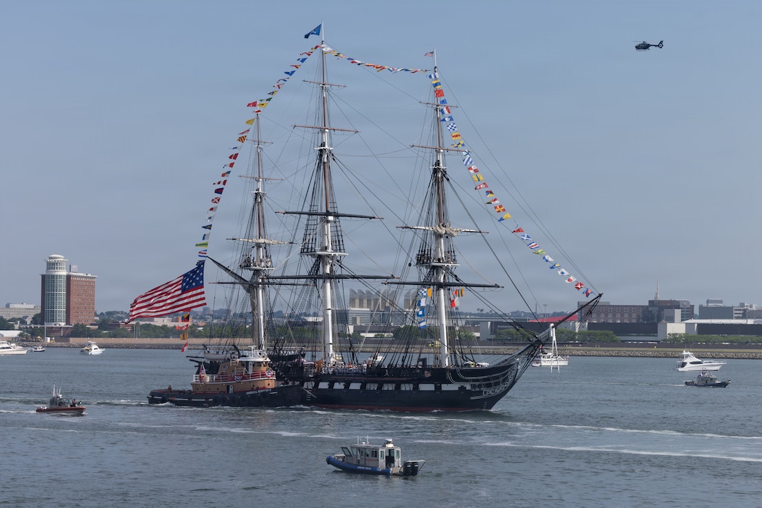 The USS Constitution sails during the SAIL250 Grand Parade of Sail Ceremony in Boston, Massachusetts, July 11, 2026. SAIL250 Boston celebrates America’s maritime heritage and the nation’s 250th anniversary by bringing together U.S. and international ships, Marines, Sailors, and community partners throughout the city. (U.S. Marine Corps photo by Lance Cpl. Michael Robinson)