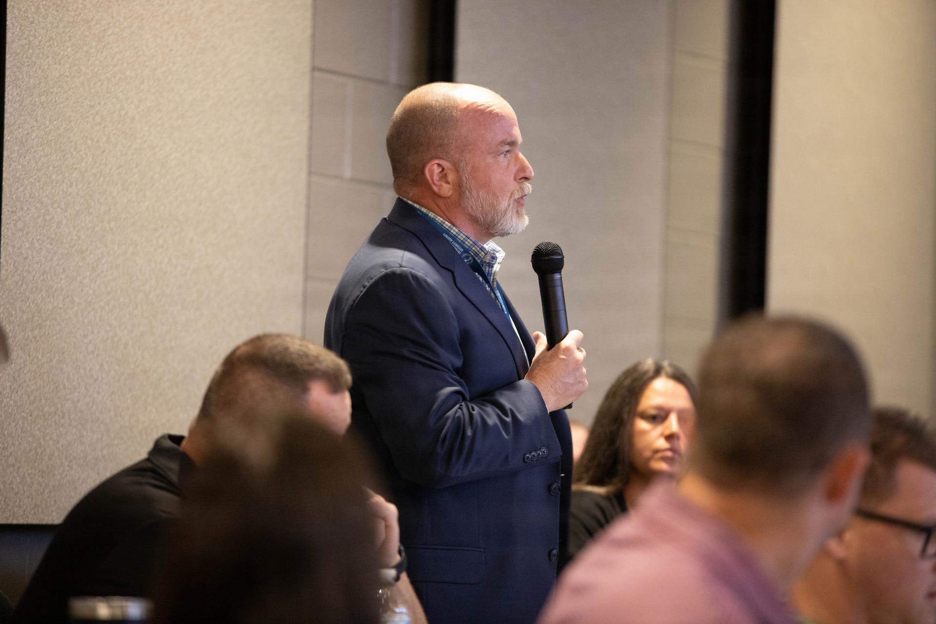 Dr. Kyle Wolf from the Cybersecurity and Infrastructure Security Agency (CISA) asks a question during the Kentucky Resilience and Emergency Preparedness (K-REP) Summit at Boone National Guard Center in Frankfort, Kentucky, June 16-17.