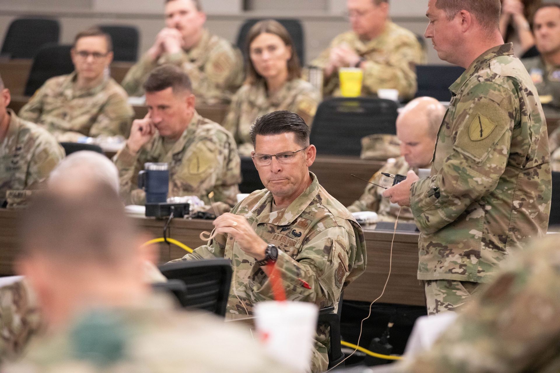 U.S. Air Force Brig. Gen. Ash Groves asks a question during the Kentucky Resilience and Emergency Preparedness (K-REP) Summit at Boone National Guard Center in Frankfort, Kentucky, June 16-17.
