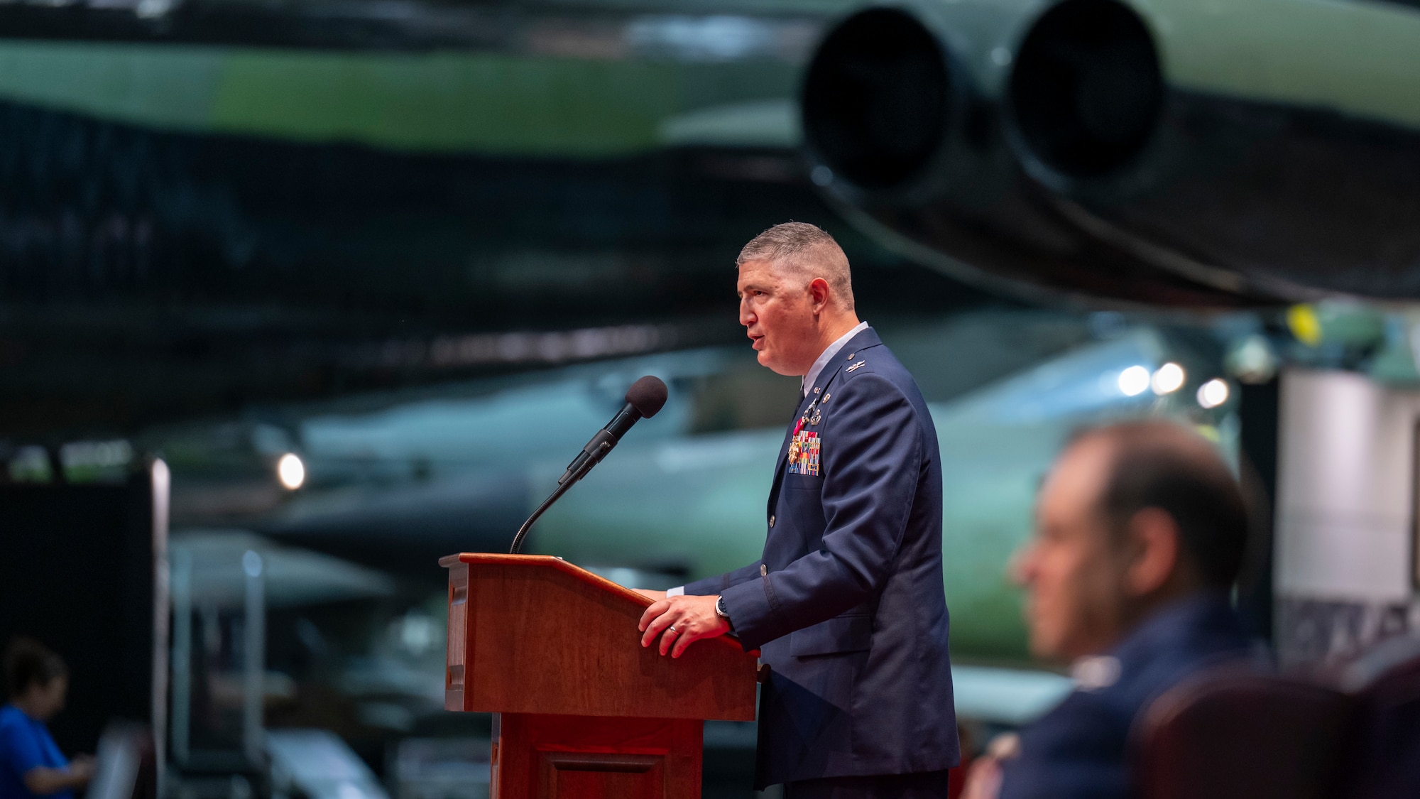 Col. Kenneth Stremmel, outgoing National Air and Space Intelligence Center commander, gives his remarks to NASIC personnel during the change of command ceremony at the National Museum of the United States Air Force, Wright-Patterson Air Force Base, Ohio, July 10, 2026. NASIC is tasked with discovering and characterizing air, space, missile, and cyber threats to enable full-spectrum multi-domain operations, drive weapon system acquisition, and inform national defense policy. (U.S. Air Force photo by Staff Sgt. Samuel Earick)