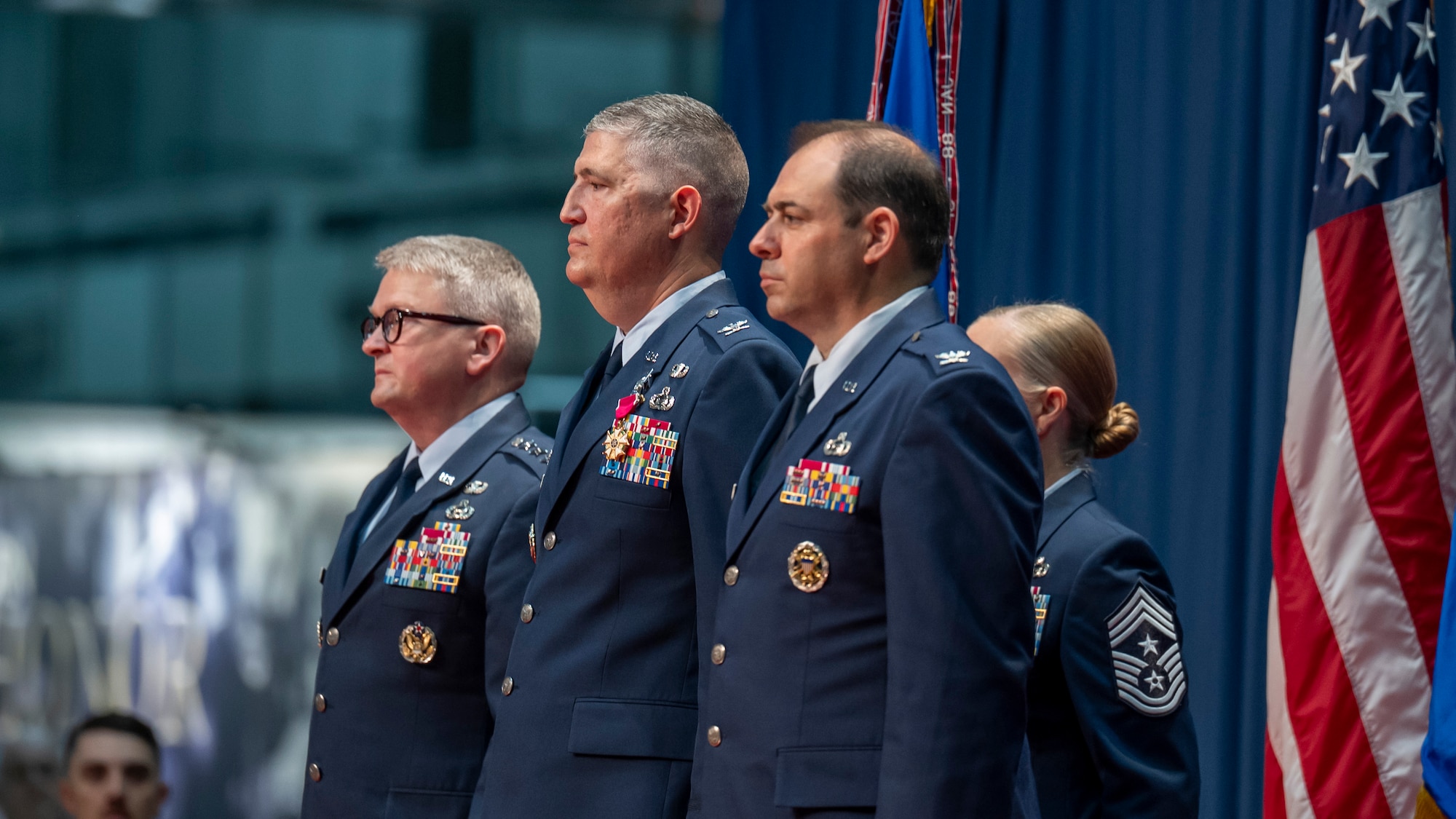 From left, Lt. Gen. Max Pearson, Deputy Chief of Staff for Intelligence, Col. Kenneth Stremmel, outgoing National Air and Space Intelligence Center commander, and Col. Tyson Wetzel, incoming NASIC commander, prepare to execute the change of command ceremony at the National Museum of the United States Air Force, Wright-Patterson Air Force Base, Ohio, July 10, 2026. The change of command ceremony is a time-honored tradition, recognizing the passing of authority from one leader to the next. (U.S. Air Force photo by Staff Sgt. Samuel Earick)