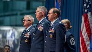 From left, Lt. Gen. Max Pearson, Deputy Chief of Staff for Intelligence, Col. Kenneth Stremmel, outgoing National Air and Space Intelligence Center commander, and Col. Tyson Wetzel, incoming NASIC commander, prepare to execute the change of command ceremony at the National Museum of the United States Air Force, Wright-Patterson Air Force Base, Ohio, July 10, 2026. The change of command ceremony is a time-honored tradition, recognizing the passing of authority from one leader to the next. (U.S. Air Force photo by Staff Sgt. Samuel Earick)