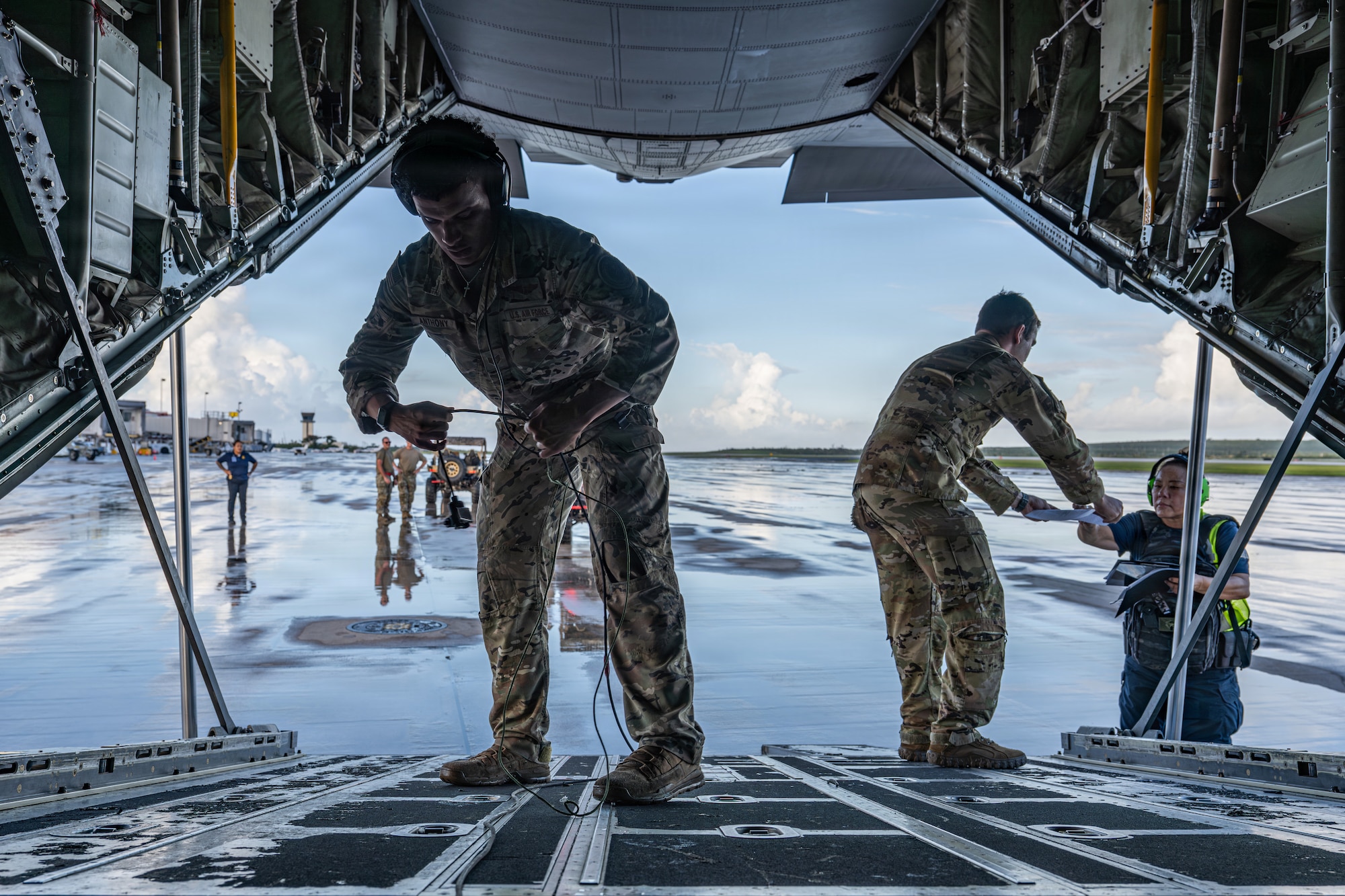 U.S. Air Force Staff Sgt. Darius Anthony, 39th Airlift Squadron advanced instructor loadmaster, and Airman 1st Class Samuel Hampton, 39th AS loadmaster, prepare to load Polaris MRZR’s onto a C-130J Super Hercules at Saipan International Airport, Northern Mariana Islands, June 29, 2026, in support of VALIANT SHIELD 2026. Exercises like VALIANT SHIELD allow Pacific Command Joint Forces the opportunity to integrate forces from all branches of service and with our allies to conduct precise, lethal, and overwhelming multi-axis, multi-domain effects that demonstrate the strength and versatility of the joint force and our commitment to a free and open Indo-Pacific. (U.S. Air Force photo by Airman 1st Class Caleb Schellenberg)