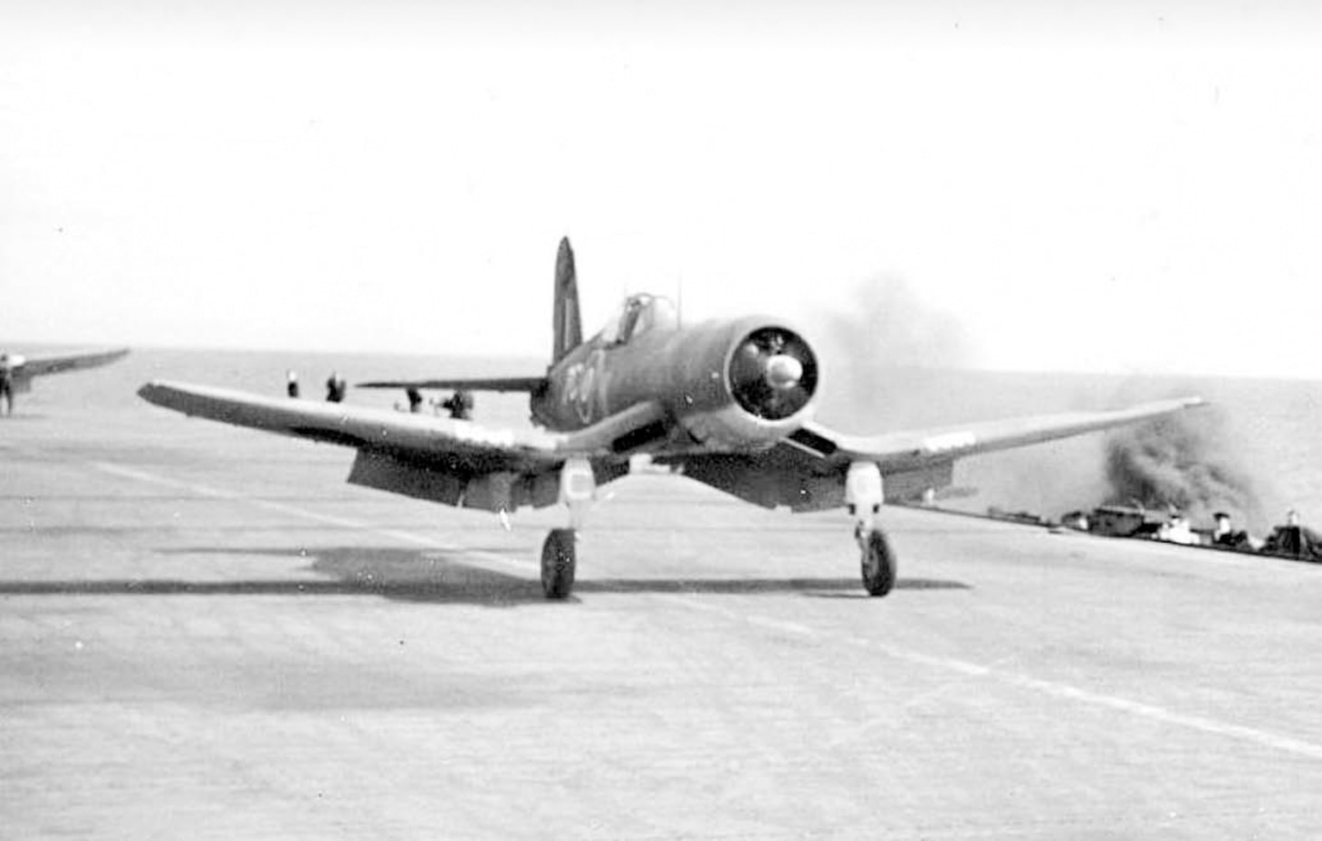 This Corsair is thought to be flown (perhaps in early 1944) by Royal Navy Lt. Cmdr. Richard John Cork, the wing leader of the Royal Navy’s 15th Naval Fighter Wing aboard the carrier HMS Illustrious. He was an accomplished naval aviator in World War II, as well as fighter ace having flown the Hawker Hurricane. The Corsair’s long nose could pose problems in lining up for an approach for deck landings, but Cork was up to the job.