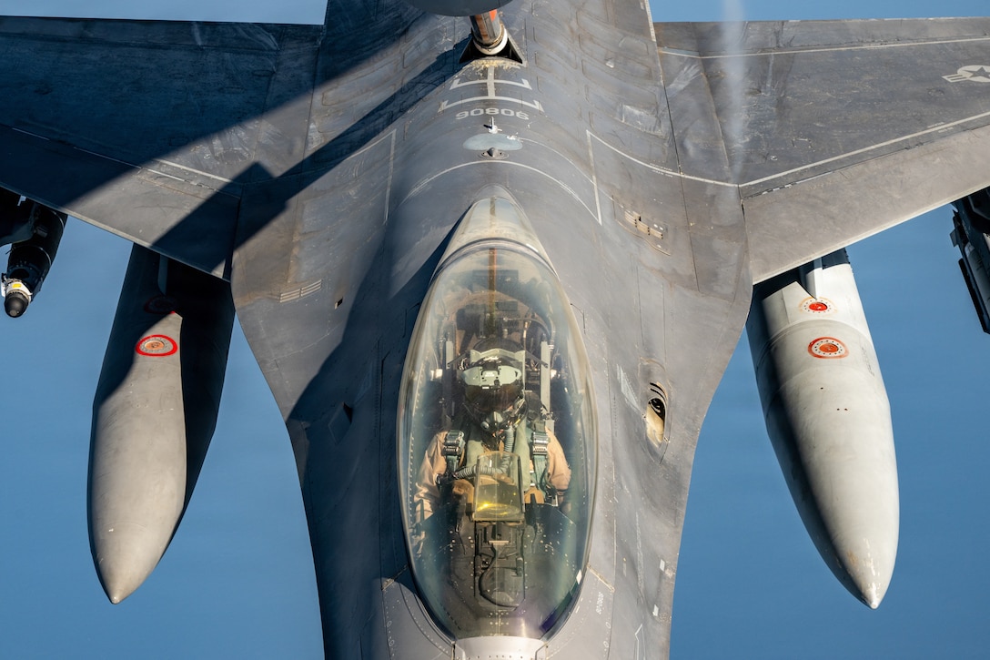 A U.S. Air Force F-16 Fighting Falcon aircraft receives fuel from the boom of a U.S. Air Force KC-135 Stratotanker aircraft in the U.S. Central Command area of responsibility June 30, 2026. (U.S. Air Force photo by Tech Sgt Tiffany A. Emery)