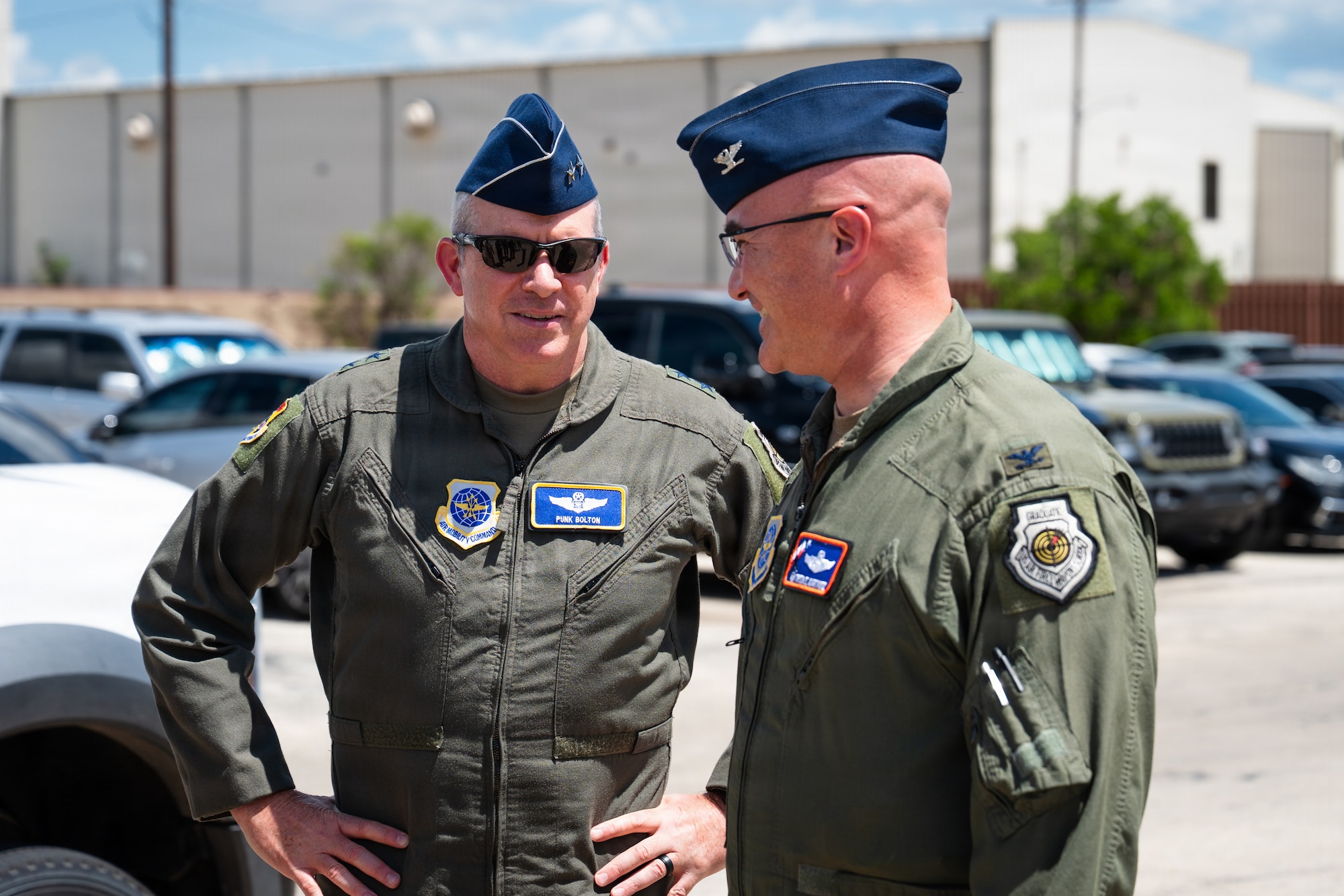 U.S. Air Force Maj. Gen. Charles Bolton, left, Eighteenth Air Force commander, is welcomed by Col. Christopher Martinez, 317th Operations Group commander, prior to touring 317th Airlift Wing facilities and presenting the Gallant Unit Citation to the 40th Airlift Squadron at Dyess Air Force Base, Texas, July 7, 2026. Bolton presented the Gallant Unit Citation to the 40th AS for their operations overseas and presided over the 317th AW Change of Command the following day. (U.S. Air Force photo by Senior Airman Jade M. Caldwell)