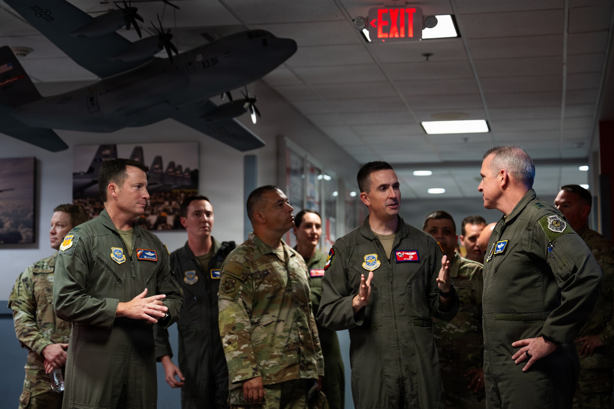 U.S. Air Force Maj. Gen. Charles Bolton, right, Eighteenth Air Force commander, tours 317th Airlift Wing facilities prior to presenting the Gallant Unit Citation to the 40th Airlift Squadron at Dyess Air Force Base, Texas, July 7, 2026. Bolton recognized the wing’s achievements in recent months and discussed potential building plans that advance future operations. (U.S. Air Force photo by Senior Airman Jade M. Caldwell)