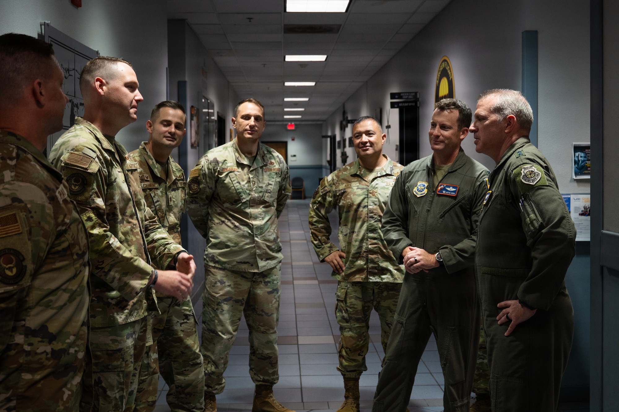 U.S. Air Force Maj. Gen. Charles Bolton, right, Eighteenth Air Force commander, tours 317th Airlift Wing facilities prior to presenting the Gallant Unit Citation to the 40th Airlift Squadron at Dyess Air Force Base, Texas, July 7, 2026. Bolton recognized the wing’s achievements in recent months and discussed potential building plans that advance future operations. (U.S. Air Force photo by Senior Airman Jade M. Caldwell)