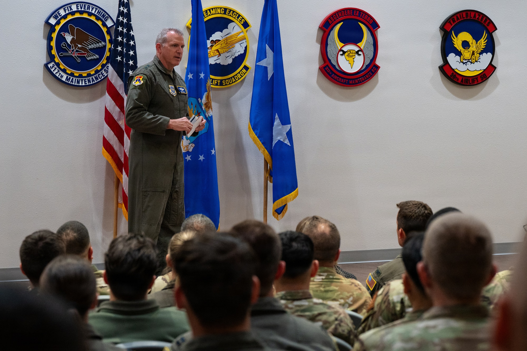 U.S. Air Force Maj. Gen. Charles Bolton Eighteenth Air Force commander, gives opening remarks prior to presenting the Gallant Unit Citation to the 40th Airlift Squadron at Dyess Air Force Base, Texas, July 7, 2026. In March 2004, the Secretary of the Air Force approved the Gallant Unit Citation to recognize organizations for outstanding heroism in combat. (U.S. Air Force photo by Senior Airman Jade M. Caldwell)
