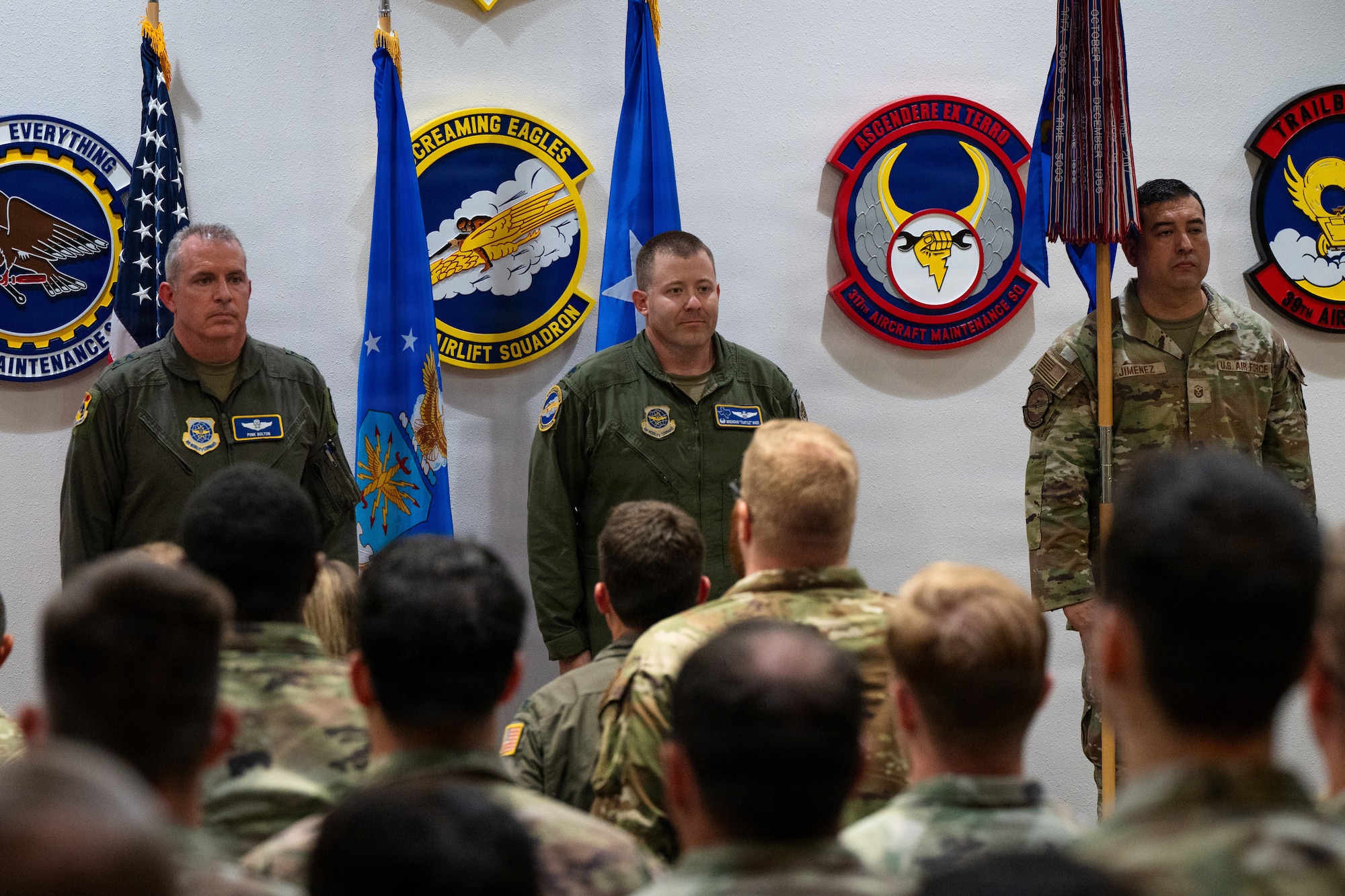 U.S. Air Force Maj. Gen. Charles Bolton, left, Eighteenth Air Force commander, presents the Gallant Unit Citation to the 40th Airlift Squadron alongside Lt. Col. Brendan Wier, 40th AS commander, at Dyess Air Force Base, Texas, July 7, 2026. In March 2004, the Secretary of the Air Force approved the Gallant Unit Citation to recognize organizations for outstanding heroism in combat. (U.S. Air Force photo by Senior Airman Jade M. Caldwell)