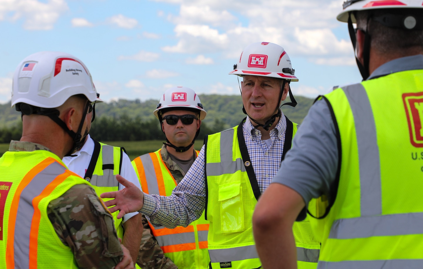 U.S. Sen. Pete Ricketts talks to Col. Robert Newbauer, U.S. Army Corps of Engineers, Omaha District commander, and other project leaders during a tour of rehabilitation efforts on the R-562 levee system June 15, 2026.