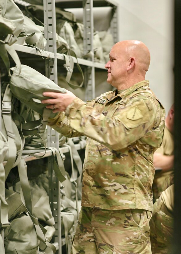 Sgt. 1st Class Joshua Settles poses for a portrait at Boone National Guard Center in Frankfort, Kentucky, June 26, 2026, before his retirement ceremony.