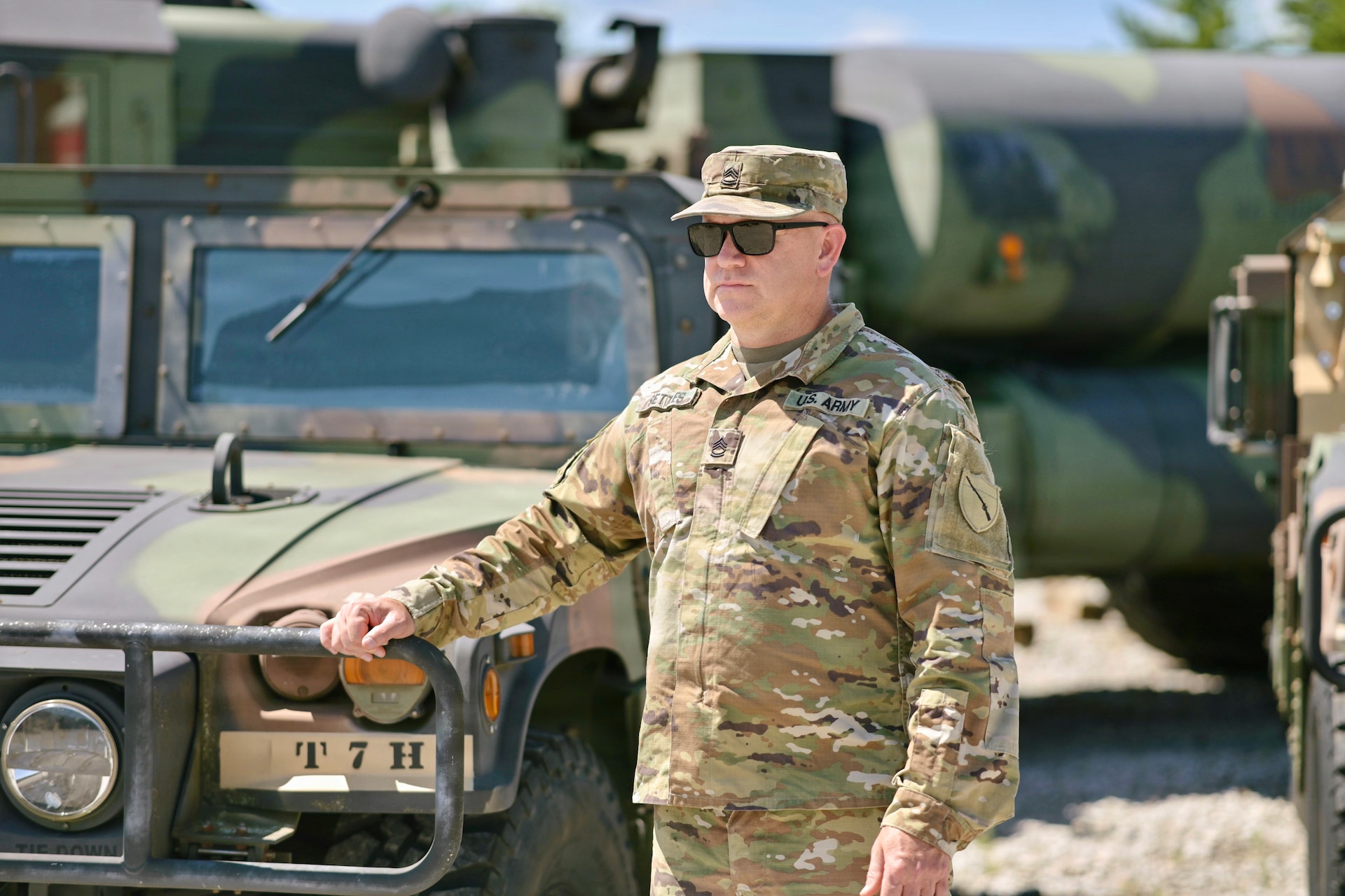 Sgt. 1st Class Joshua Settles poses for a portrait at Boone National Guard Center in Frankfort, Kentucky, June 26, 2026, before his retirement ceremony.