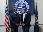 Deputy Senior Competency Manager of Production Innovation and Materiel Readiness Engineering at Naval Information Warfare Center Atlantic, Kenric W. “Rick” Johnson (left) visits NSWCPD to shadow Technical Director, Nigel C. Thijs, SES, as part of the Department of the Navy’s Bridging the Gap Leadership Development Program. (U.S. Navy photo by Margaret A. Kenyon)