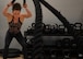 Jill Cangealose, personal trainer, performs a battle reop exercise at Minot Air Force Base, North Dakota, June 10, 2026. Jill helped Airmen improve strength, mobility, nutrition and overall fitness to support mission readiness.