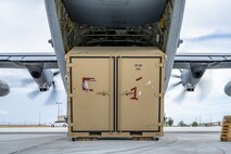 Cargo is offloaded from a C-130J Super Hercules during combat offload Method C training at Anderson Air Force Base, Guam, June 24, 2026, in support of VALIANT SHIELD 2026. Exercises like VALIANT SHIELD allow Pacific Command Joint Forces the opportunity to integrate forces from all branches of service and with our allies to conduct precise, lethal and overwhelming multi-axis, multi-domain effects that demonstrate the strength and versatility of the joint force and our commitment to a free and open Indo-Pacific. (U.S. Air Force photo by Airman 1st Class Caleb Schellenberg)