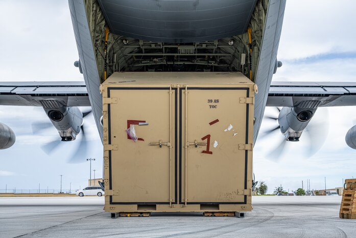 Cargo is offloaded from a C-130J Super Hercules during combat offload Method C training at Anderson Air Force Base, Guam, June 24, 2026, in support of VALIANT SHIELD 2026. Exercises like VALIANT SHIELD allow Pacific Command Joint Forces the opportunity to integrate forces from all branches of service and with our allies to conduct precise, lethal and overwhelming multi-axis, multi-domain effects that demonstrate the strength and versatility of the joint force and our commitment to a free and open Indo-Pacific. (U.S. Air Force photo by Airman 1st Class Caleb Schellenberg)