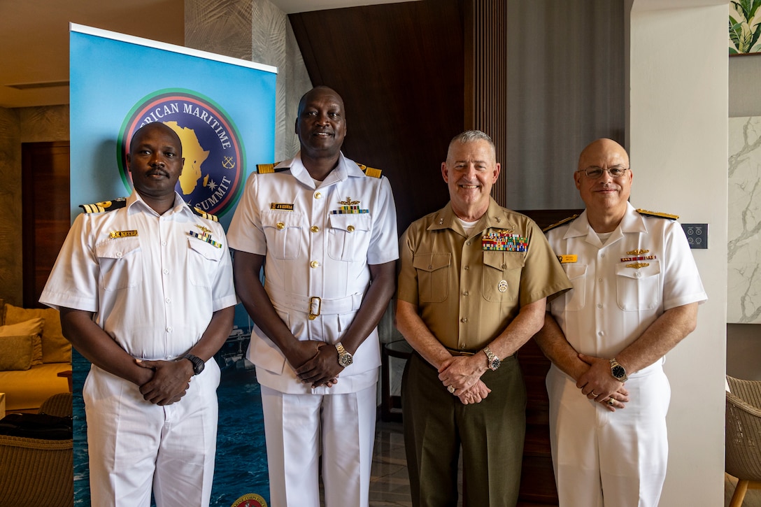 From left to right, Kenya Navy Lt. Col. Justus Keter, special operations commander of the Kenya Navy, Kenya Navy Brig. Gen. John Sankale Kiswaa, deputy commander of the Kenya Navy, U.S. Marine Corps Maj. Gen. Robert B. Sofge Jr., commander, U.S. Marine Corps Forces Europe and Africa, and U.S. Navy Rear Adm. Michael S. Mattis, commander, Command Task Force 66, pose for a photo during a bilateral engagement in Pointe aux Piments, Mauritius, June 26, 2025. African Maritime Forces Summit is a summit that seeks to bring together senior leaders from African maritime forces, naval infantries, and militaries, alongside international partners, to address critical maritime security challenges facing the African continent. (U.S. Marine Corps photo by Sgt. Addysyn Tobar)