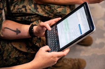 A U.S. Navy corpsman assigned to the II Marine Expeditionary Force provides feedback during an end-user touchpoint at the Tactical Medicine Training Center, Camp Lejeune, North Carolina, June 30, 2026. The event brought together U.S. Navy corpsmen and medical officers from across the II Marine Expeditionary Force to assess new capabilities for evaluating traumatic brain injuries on the battlefield. Participants evaluated Traumatic Brain Injury Field Assessment Program devices in a hands-on session, giving TBI-FAP developers critical feedback directly from the frontline medical providers who may one day use the equipment in austere environments. (Defense Health Agency Photo by T. T. Parish/Released)