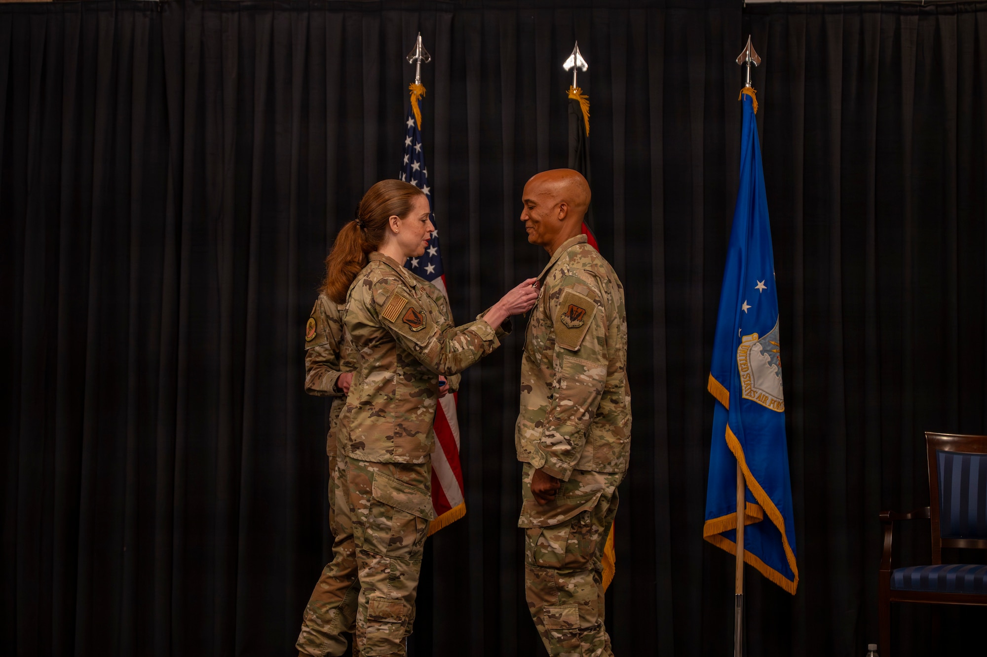 A photo of an Airman receiving an award