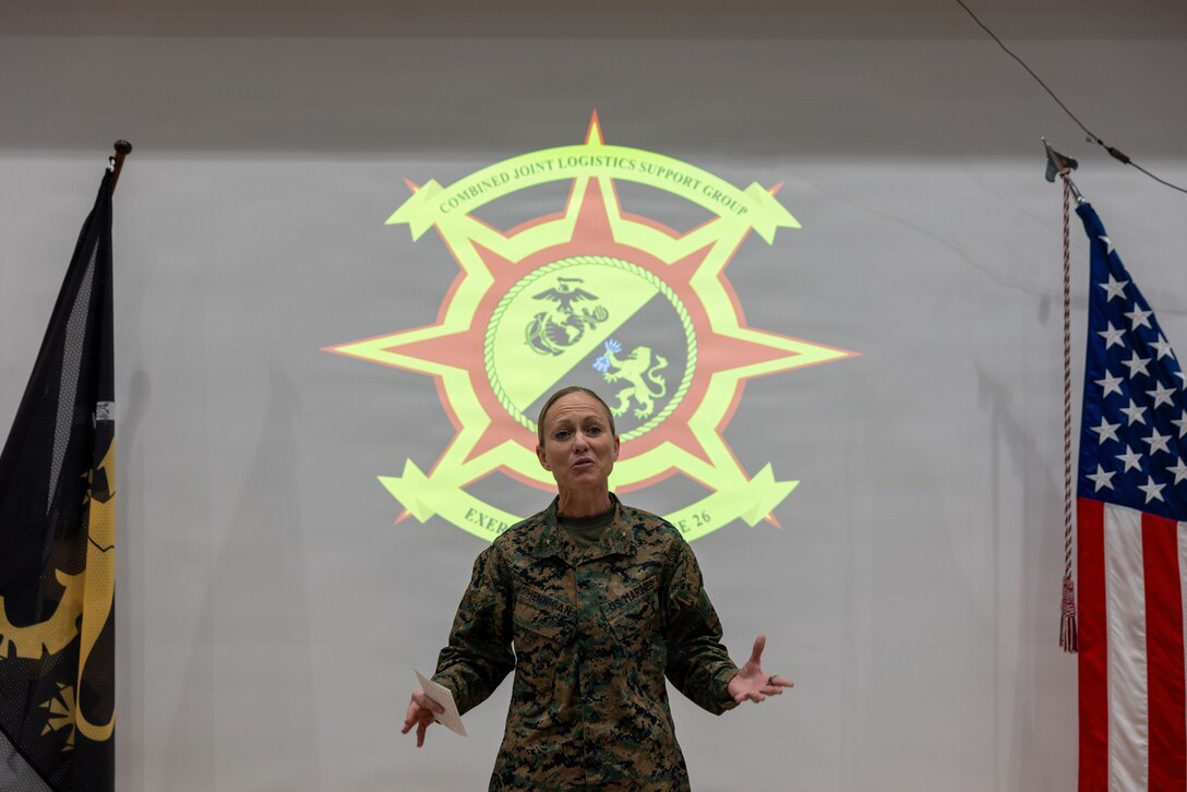 U.S. Marine Corps Brig. Gen. Maura M. Hennigan, incoming commander of the exercise Cold Response 26 Combined Joint Logistics Support Group, delivers remarks during a transfer of authority ceremony at Kjeller Air Base, Norway, Feb. 27, 2026. A key component of NATO's enhanced vigilance activity Arctic Sentry, exercise Cold Response 26 is a Norwegian-led winter military exercise designed to enhance collective defense capabilities and ensure U.S. readiness to rapidly deploy and seamlessly operate alongside NATO Allies in challenging arctic conditions. (U.S. Marine Corps photo by Sgt. Rafael Brambila-Pelayo)