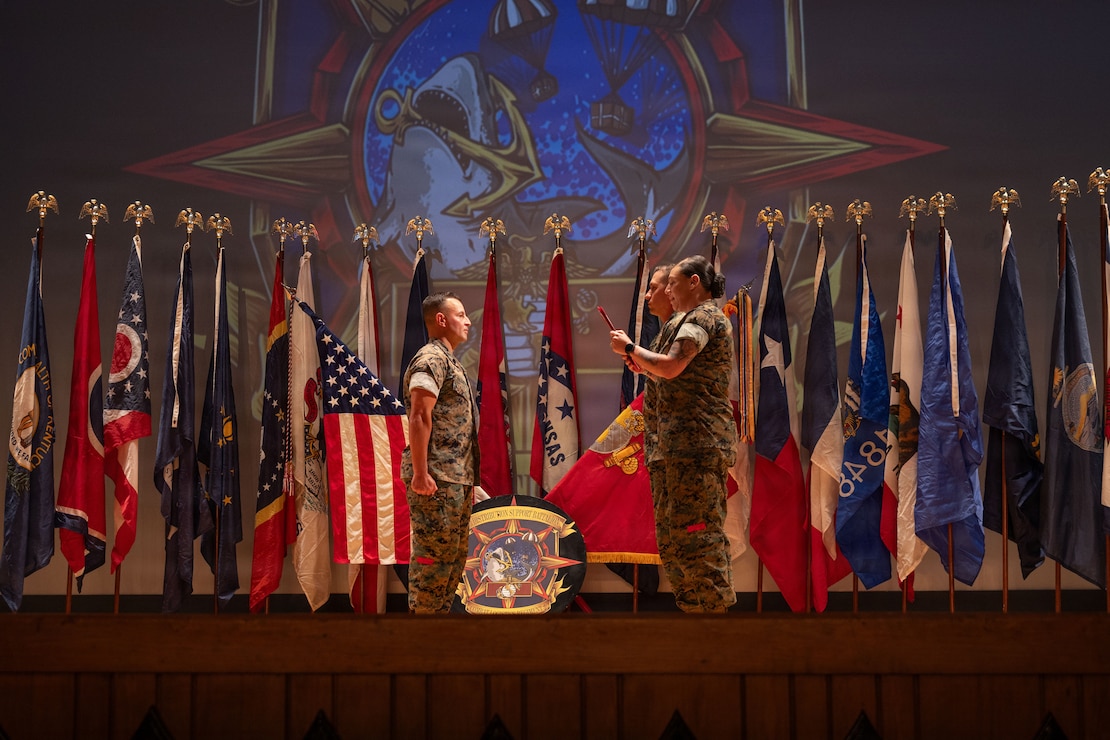U.S. Marine Corps Sgt. Maj. Efrain Barrientos, the offgoing senior enlisted leader for 2nd Distribution Support Battalion, Combat Logistics Regiment 2, 2nd Marine Logistics Group, receives a meritorious service medal during a relief and appointment ceremony at Marine Corps Base Camp Lejeune, North Carolina, July 10, 2026. The relief and appointment ceremony marked the transfer of responsibilities, accountability, and authority from Barrientos to Sgt. Maj. Bryan K. Brashear. Barrientos is a native of Guatemala. (U.S. Marine Corps photo by Lance Cpl. Isabelle Veillette)