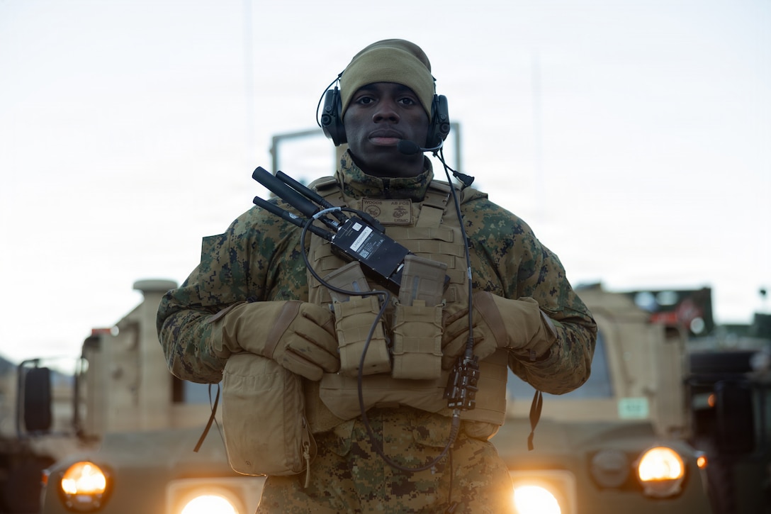 U.S. Marine Corps Lance Cpl. Xaveia Woods, a motor vehicle operator with 2nd Distribution Support Battalion, Combat Logistics Regiment 27, 2nd Marine Logistics Group, poses for a photo before a tactical convoy in preparation for exercise Cold Response 26 in Tromsdalen, Norway, Jan. 22, 2026. The Marine Corps Pre-positioning Program-Norway, managed by Blount Island Command, enables the rapid outfitting of a deployed Marine Air-Ground Task Force by storing ready-to-use equipment in climate-controlled caves. Exercise Cold Response 26 is a Norwegian-led winter military exercise designed to enhance collective defense capabilities and ensure U.S. readiness to rapidly deploy and seamlessly operate alongside NATO Allies in challenging arctic conditions. Woods is a native of Louisiana. (U.S. Marine Corps photo by Lance Cpl. Franco Lewis)