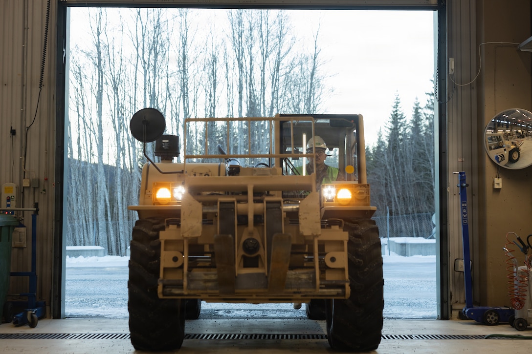 U.S. Marine Corps Lance Cpl. Ronny LimaFernandez, an engineer equipment mechanic with Marine Wing Support Squadron 273, Marine Air Control Group 28, 2nd Marine Aircraft Wing, conducts a functions check of a modernized Extendable Boom Forklift during cave draw operations in preparation for exercise Cold Response 26 in Tromsdalen, Norway, Jan. 22, 2026. The Marine Corps Pre-positioning Program-Norway, managed by Blount Island Command, enables the rapid outfitting of a deployed Marine Air-Ground Task Force by storing ready-to-use equipment in climate-controlled caves. Exercise Cold Response 26 is a Norwegian-led winter military exercise designed to enhance collective defense capabilities and ensure U.S. readiness to rapidly deploy and seamlessly operate alongside NATO Allies in challenging arctic conditions. LimaFernandez is a native of New Jersey. (U.S. Marine Corps photo by Lance Cpl. Franco Lewis)