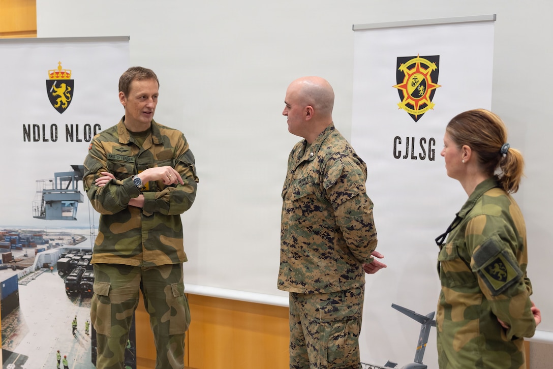 Norwegian army Chief of Defence Gen. Eirik Kristoffersen, left, speaks with U.S. Marine Corps Lt. Col. Sean Day, center, the deputy chief of staff for the Combined Joint Logistics Support Group and Norwegian army Brig. Gen. Nina S. Berg, the commanding officer of the CJLSG during a tour of the CJLSG prior to exercise Cold Response 26 in Kjeller, Norway, Feb. 23, 2026. A key component of NATO's enhanced vigilance activity Arctic Sentry, exercise Cold Response 26 is a Norwegian-led winter military exercise designed to enhance collective defense capabilities and ensure U.S. readiness to rapidly deploy and seamlessly operate alongside NATO Allies in challenging arctic conditions. (U.S. Marine Corps Photo by Sgt. Rafael Brambila-Pelayo)
