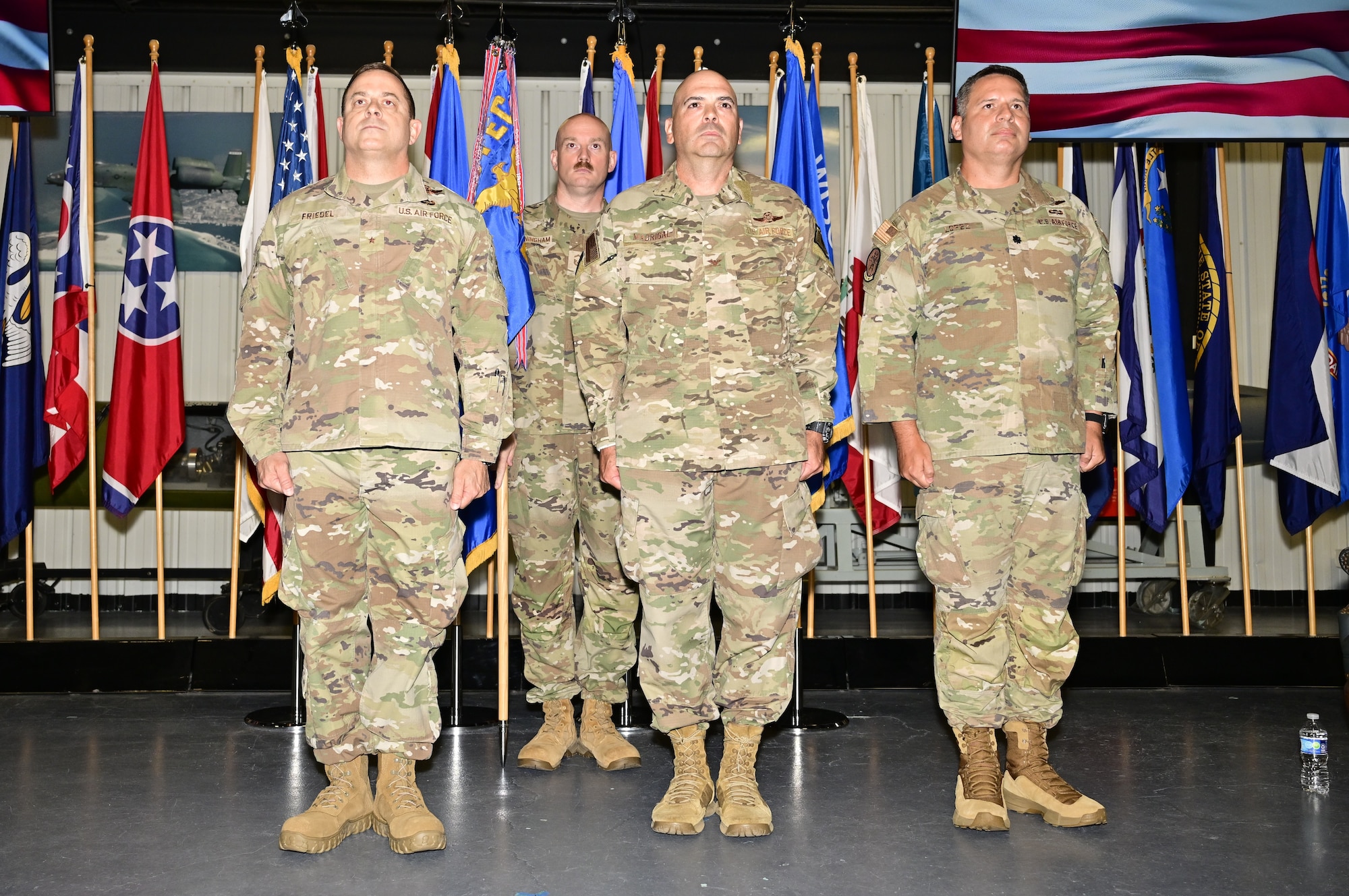 (Left) Air Force Operational Test and Evaluation Center Commander Brig. Gen. Jesse J. Friedel stands beside Col. Kevin M. Madrigal, departing AFOTEC Detachment 2 Commander, and Lt. Col. Michael Lopez, incoming AFOTEC Detachment 2 Commander during the July 9, 2026 Change of Command ceremony at Eglin AFB, Fla.