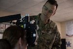 U.S. Air Force Lt. Col. John Adams, performs an eye exam during the Green River Area Wellness Innovative Readiness Training, or IRT, mission, June 17, 2026. IRT missions provide key medical, dental and optometry services to underserved communities who may not be able to access care otherwise. Photo by Tech. Sgt. Kelvin McConnell.