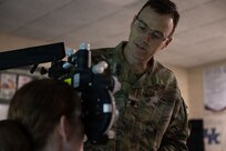 U.S. Air Force Lt. Col. John Adams, performs an eye exam during the Green River Area Wellness Innovative Readiness Training, or IRT, mission, June 17, 2026.