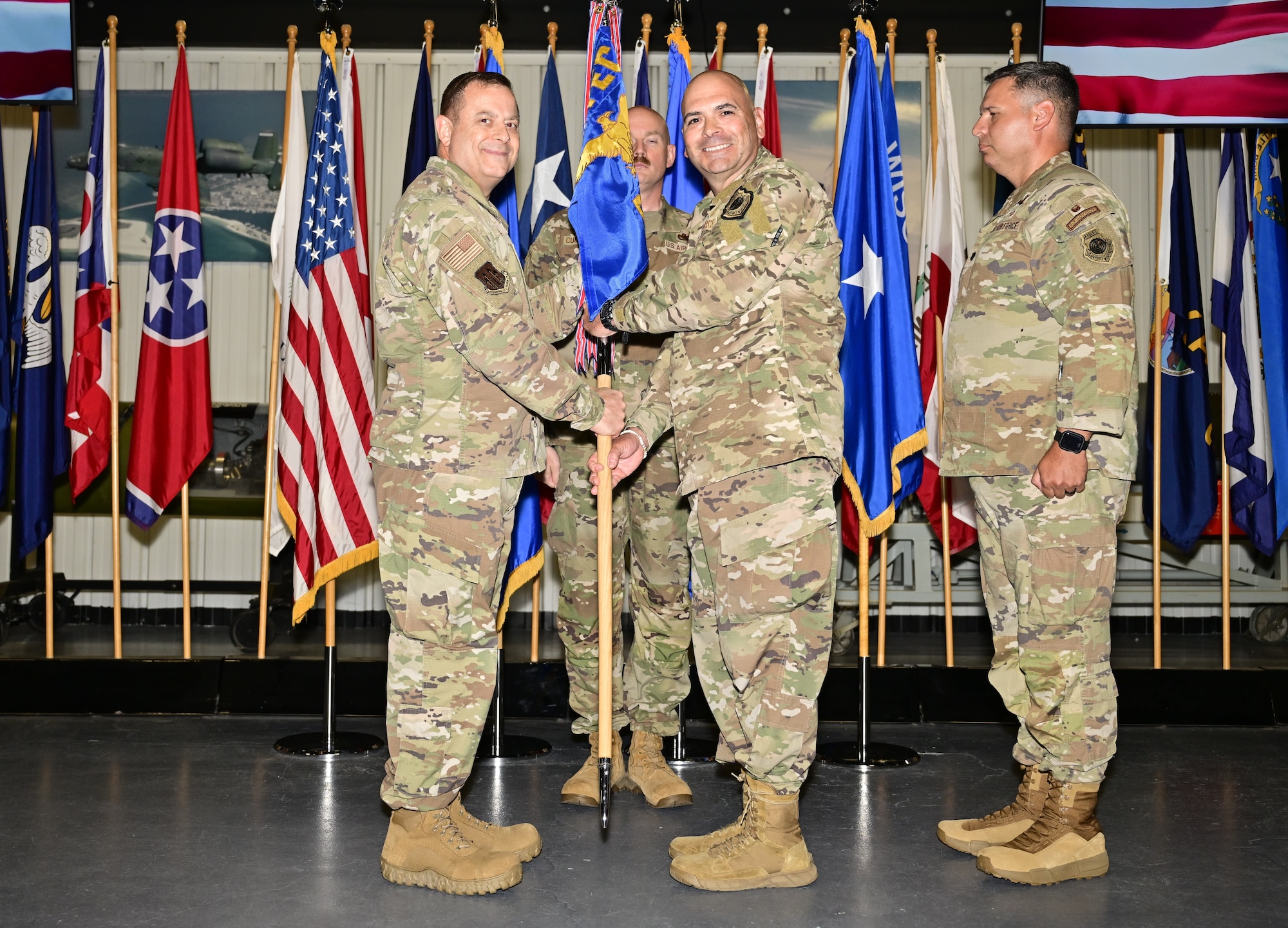 (Middle) Col. Kevin M. Madrigal relinquishes command of Air Force Operational Test and Evaluation Center Detachment 2 to (left) AFOTEC Commander Brig. Gen. Jesse J. Friedel during a Change of Command ceremony July 9, 2026, as (right) incoming Detachment 2 commander Lt. Col. Michael Lopez stands by. Madrigal is retiring after 28 years of service.