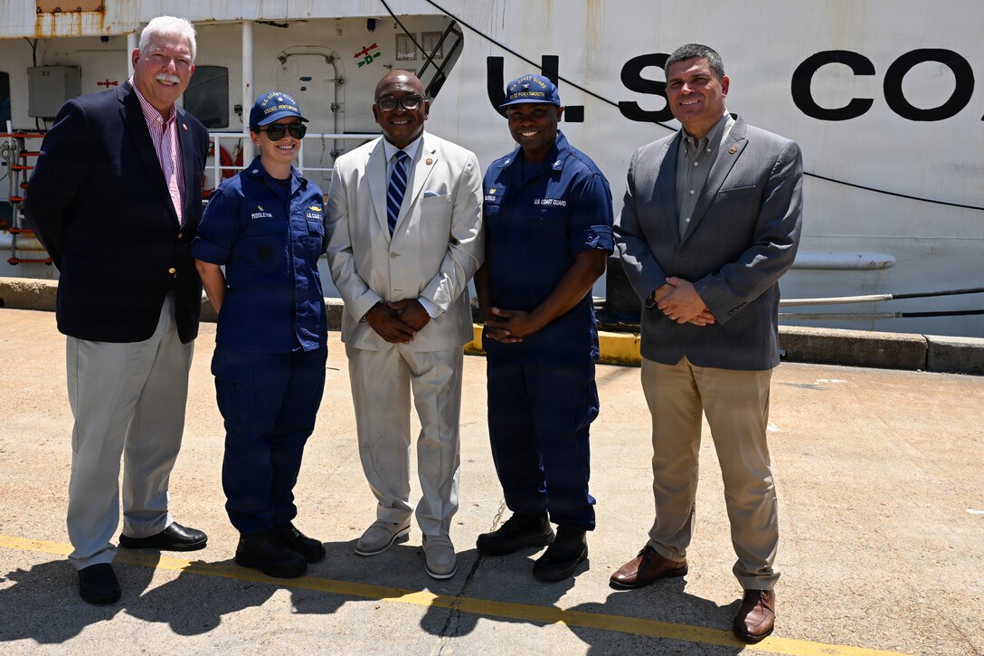 Portsmouth Mayor Shannon Glover, center, poses for a photo with the command of the Reliance-class medium-endurance cutter USCGC Venturous (WMEC 625) and Coast Guard Base Portsmouth, July 10, 2026. The Venturous is one of two 210-foot medium endurance cutters relocating from St. Petersburg, Florida, to Base Portsmouth as part of a strategic homeport shift bringing approximately 154 personnel and their families to the Hampton Roads area. (U.S. Coast Guard photo by Petty Officer 2nd Class Kate Kilroy)