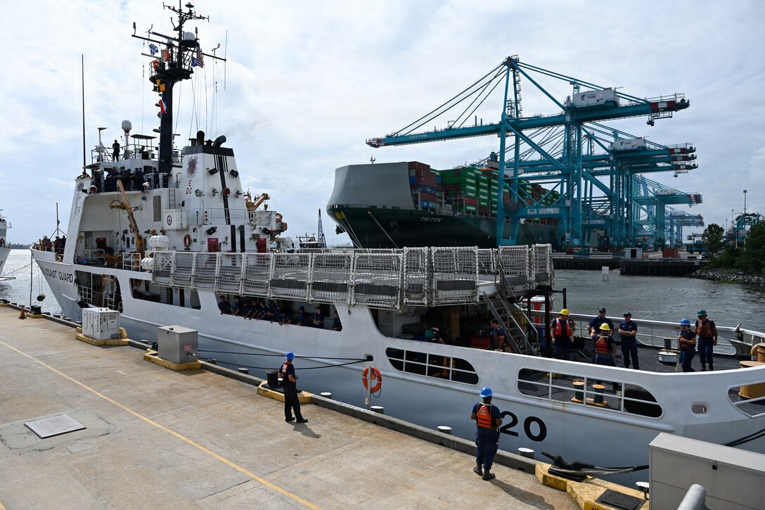 The crew of the Reliance-class medium-endurance cutter USCGC Resolute (WMEC 620) arrives at its new homeport at Coast Guard Base Portsmouth, July 13, 2026. The Resolute is one of two 210-foot medium endurance cutters relocating from St. Petersburg, Florida, to Base Portsmouth as part of a strategic homeport shift bringing approximately 154 personnel and their families to the Hampton Roads area. (U.S. Coast Guard photo by Petty Officer 2nd Class Kate Kilroy)